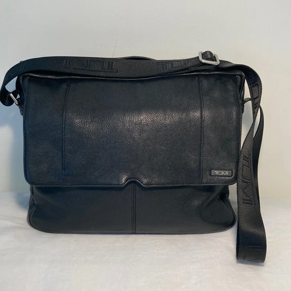 Tumi leather messenger tech lots of pockets